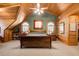Spacious main bedroom with wood-paneled walls and large windows at 1785 Whitley Rd, Dacula, GA 30019