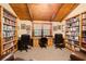 Home office with built-in bookshelves and two work stations at 1785 Whitley Rd, Dacula, GA 30019