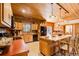 Spacious kitchen with wood cabinets, island, and stainless steel appliances at 1785 Whitley Rd, Dacula, GA 30019