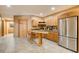 Basement kitchenette with wood cabinets and stainless steel appliances at 1785 Whitley Rd, Dacula, GA 30019