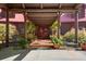 Covered entryway to log home with double doors at 1785 Whitley Rd, Dacula, GA 30019