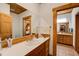 Bathroom with single vanity and view into another bathroom at 1785 Whitley Rd, Dacula, GA 30019