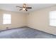 Large bedroom with ceiling fan and lots of natural light at 1849 Enid Dr, Lithonia, GA 30058