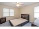 Cozy bedroom with a bed, dresser, and window at 1849 Enid Dr, Lithonia, GA 30058