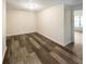 Spacious bedroom with wood-look vinyl flooring at 2575 Walden Lake Dr, Decatur, GA 30035