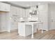 Modern kitchen with white cabinets, quartz countertops, and stainless steel appliances at 1321 Parc Bench Rd, Atlanta, GA 30316