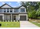 Two-story townhome with attached garage and modern exterior at 1321 Parc Bench Rd, Atlanta, GA 30316