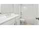 Clean bathroom with white vanity, bathtub, and shower at 1321 Parc Bench Rd, Atlanta, GA 30316