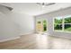 Bright living room with hardwood floors, large windows and access to patio at 1321 Parc Bench Rd, Atlanta, GA 30316