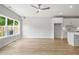 Bright living room with hardwood floors and large windows at 1321 Parc Bench Rd, Atlanta, GA 30316