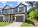 Two-story townhome with attached garage and modern exterior at 1321 Parc Bench Rd, Atlanta, GA 30316