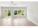 Spacious living room with hardwood floors and access to backyard at 1321 Parc Bench Rd, Atlanta, GA 30316