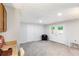 Finished basement with carpeted floor and double doors at 599 Palmer Se Ct, Conyers, GA 30094