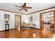 Bright living room with hardwood floors and views into other rooms at 599 Palmer Se Ct, Conyers, GA 30094