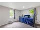 Basement bedroom with daybed and window at 599 Palmer Se Ct, Conyers, GA 30094