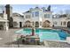 Inviting pool with fountain and spacious patio area at 4571 Columns Se Dr, Marietta, GA 30067