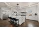 Bright kitchen with a large island, stainless steel appliances, and white cabinets at 4571 Columns Se Dr, Marietta, GA 30067