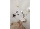 Elegant powder room with marble vanity, gold fixtures, and framed art at 4571 Columns Se Dr, Marietta, GA 30067