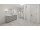 Elegant bathroom with marble flooring and modern vanity at 4571 Columns Se Dr, Marietta, GA 30067