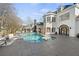 Resort-style pool with spa and expansive patio at 4571 Columns Se Dr, Marietta, GA 30067