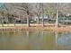 Serene pond with charming barn in the background at 4571 Columns Se Dr, Marietta, GA 30067