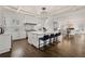 Spacious kitchen with large island, white cabinets, and hardwood floors at 4571 Columns Se Dr, Marietta, GA 30067