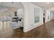 Elegant hallway with hardwood floors and arched doorways leading to various rooms at 4571 Columns Se Dr, Marietta, GA 30067