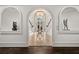 Stunning entryway with view of grand staircase and chandelier at 4571 Columns Se Dr, Marietta, GA 30067