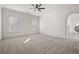 Spacious bedroom with plenty of natural light and a ceiling fan at 4571 Columns Se Dr, Marietta, GA 30067