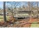 Picturesque footbridge over a small creek, leading to a pond at 4571 Columns Se Dr, Marietta, GA 30067
