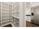Large walk-in pantry with ample shelving and wire baskets at 4571 Columns Se Dr, Marietta, GA 30067