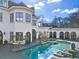 Stunning pool and patio, reflecting the beautiful home at 4571 Columns Se Dr, Marietta, GA 30067