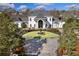 Elegant home with circular driveway and fountain at 4571 Columns Se Dr, Marietta, GA 30067