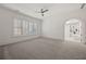 Spacious bedroom with large windows and plush carpeting at 4571 Columns Se Dr, Marietta, GA 30067