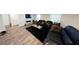 Spacious living room with hardwood floors and fireplace at 163 Kingfisher Walk, Covington, GA 30014