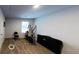 Bright room with elliptical and foldable exercise mat at 163 Kingfisher Walk, Covington, GA 30014