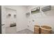 Bright laundry room with shelving and storage at 600 Silver Moon Dr # 08, Loganville, GA 30052