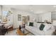 Living room with light walls, large windows, and comfortable seating at 600 Silver Moon Dr # 08, Loganville, GA 30052