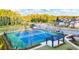 Two well-maintained tennis courts with a shaded pavilion at 600 Silver Moon Dr # 08, Loganville, GA 30052