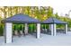 Two covered cabanas with seating for residents at 600 Silver Moon Dr # 08, Loganville, GA 30052