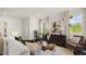 Spacious living room with ample natural light and comfortable seating at 600 Silver Moon Dr # 08, Loganville, GA 30052