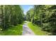 Paved trail winding through a lush green landscape at 600 Silver Moon Dr # 08, Loganville, GA 30052