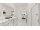 Elegant bathroom with double vanity, walk-in shower, and marble floors at 600 Silver Moon Dr # 08, Loganville, GA 30052
