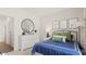Spacious bedroom with a comfortable bed and dresser at 600 Silver Moon Dr # 08, Loganville, GA 30052