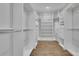 Large walk-in closet with custom shelving and drawers at 2334 Paces Ferry Se Rd, Smyrna, GA 30080