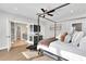 Luxurious main bedroom with en-suite bathroom and hardwood floors at 2334 Paces Ferry Se Rd, Smyrna, GA 30080