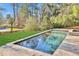 Inviting swimming pool with a spacious patio area at 2334 Paces Ferry Se Rd, Smyrna, GA 30080