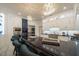 Elegant kitchen with white cabinetry, a large island, and marble flooring at 5326 Presley Pl, Douglasville, GA 30135