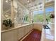 Long bar with marble top and decorative columns at 5326 Presley Pl, Douglasville, GA 30135