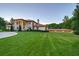Grand estate with manicured lawn and gated entry at 5326 Presley Pl, Douglasville, GA 30135